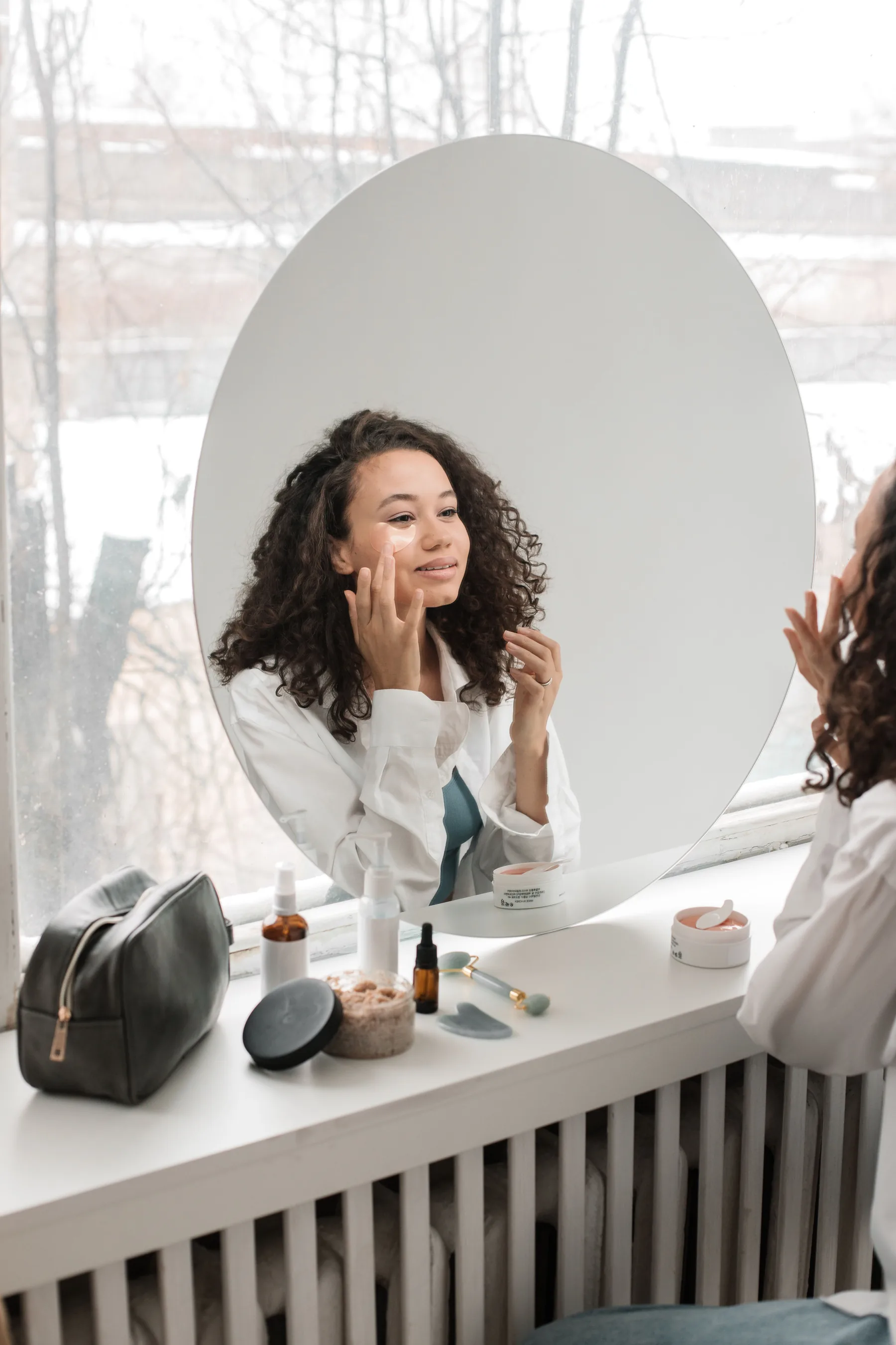 A woman enjoying a calm morning skincare ritual